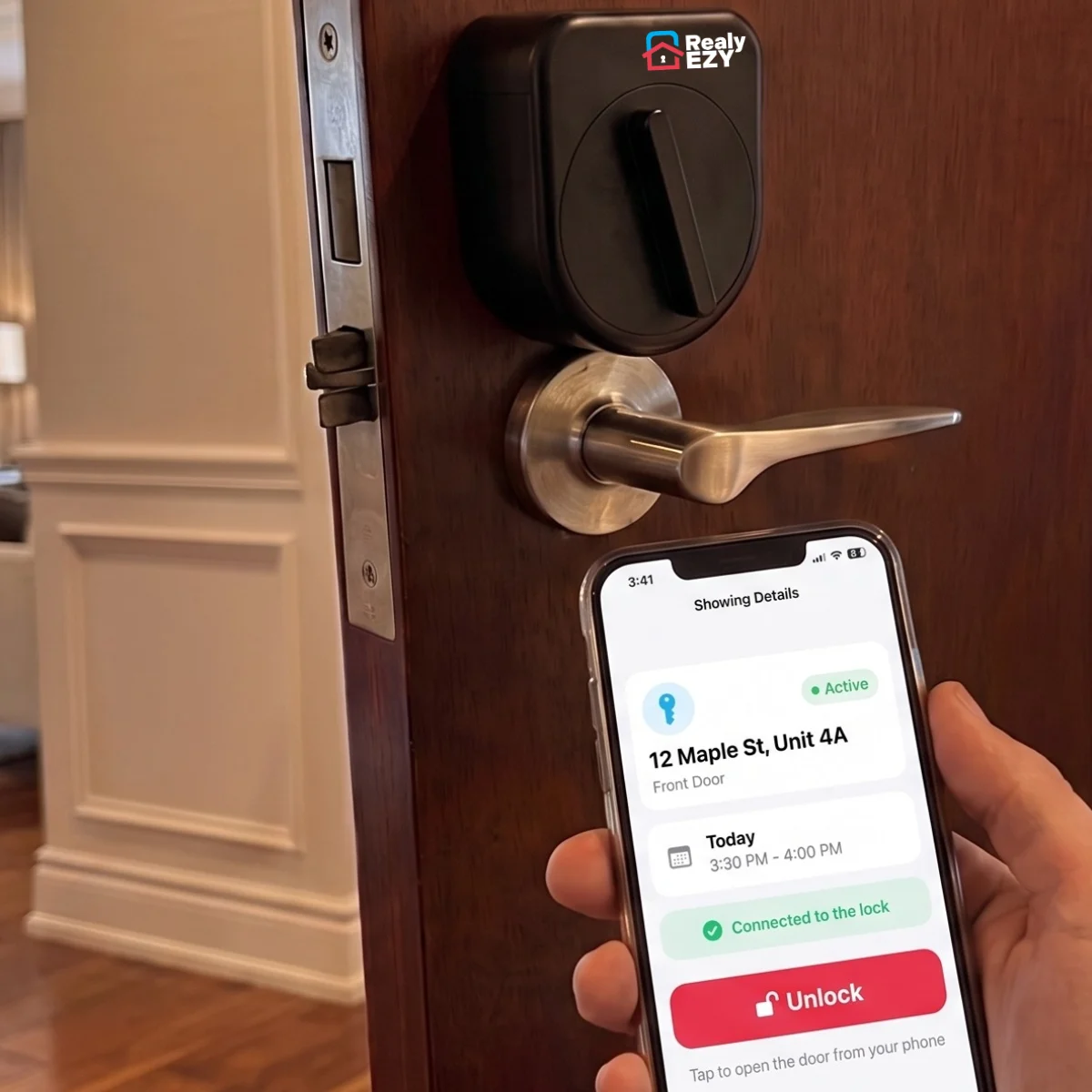 An agent at an open front door holding the Realy EZY app on their phone, showing the unlock controls for the showing, with the smart lock fitted above the handle