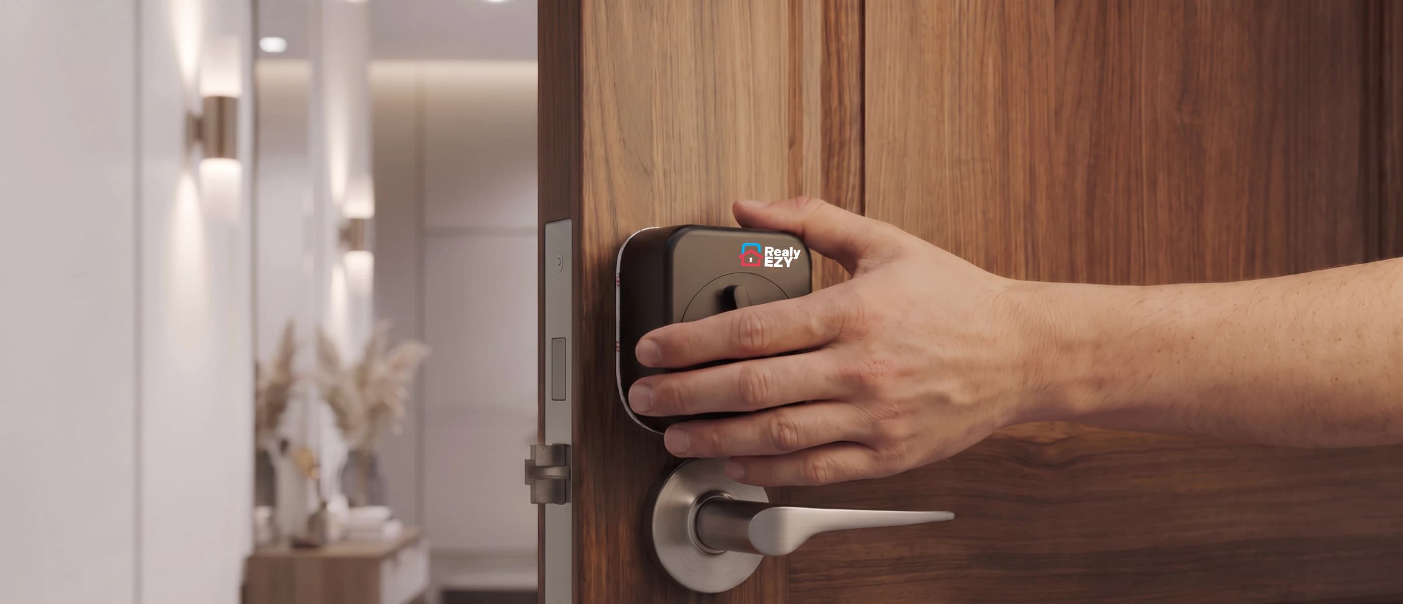 A hand pressing a Realy EZY smart lock onto the deadbolt of a front door